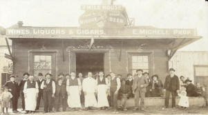 7 Mile House circa June 1904. Original owner, Egidio Micheli, center with apron, with partner, Palmiro Testa (right). Lady on the far right back holding baby Ecle is Niccola Testa. Little girl on far right is Eva Testa | Courtesy of 7 Mile House