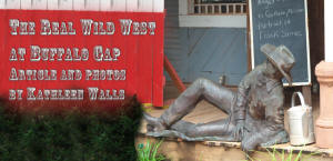 Buffalo Gap Village header with cowboy stature lounging on porch
